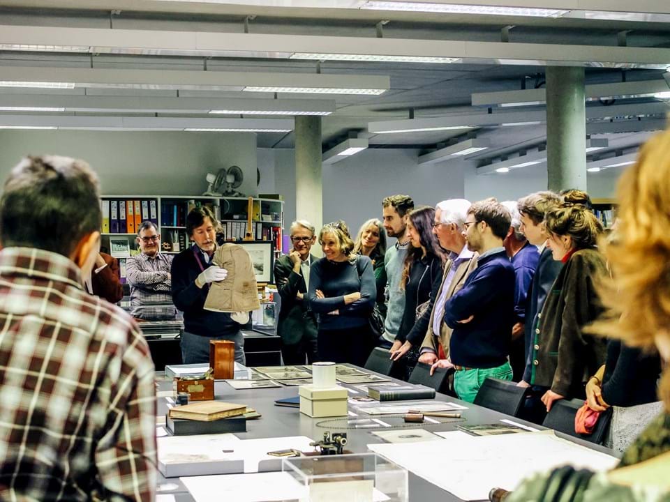 Photo of people looking at the Society's Collections