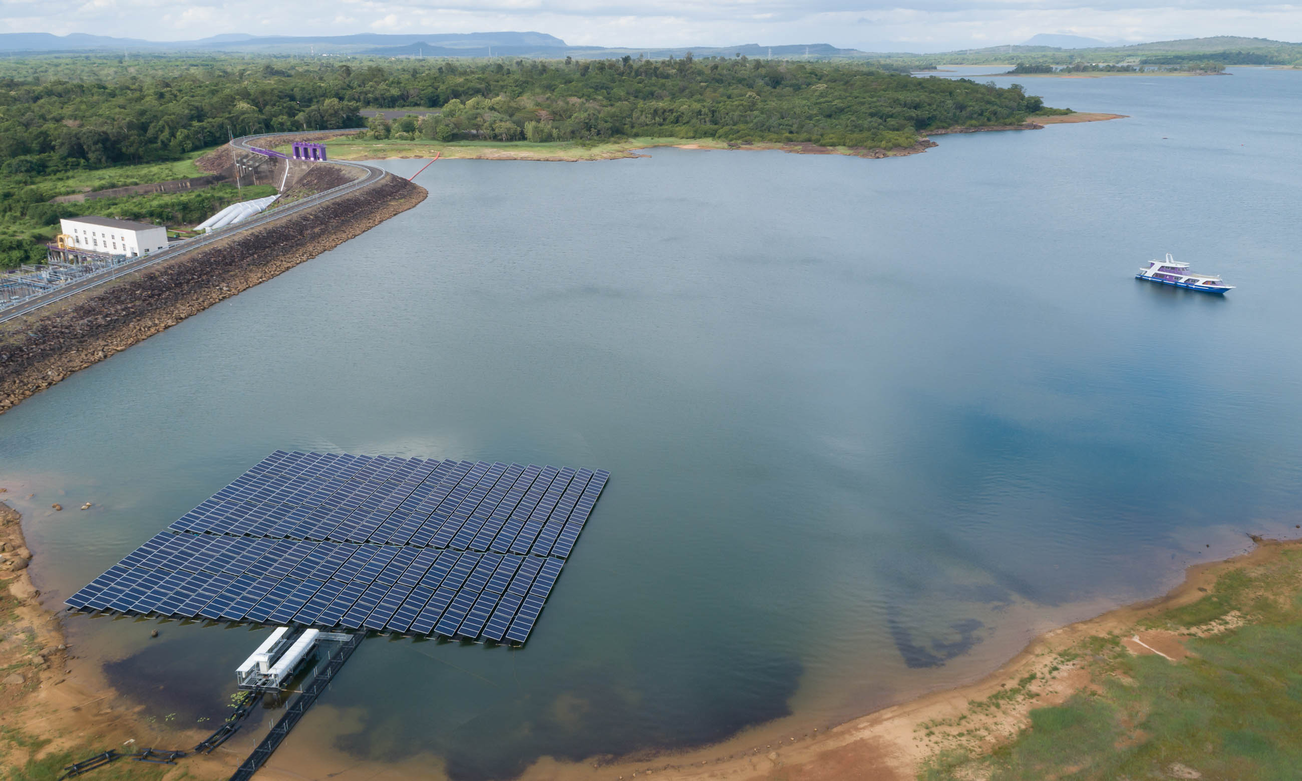 Aerial view of floating solar panels on a lake (Image: KissShot/Adobe Stock)
